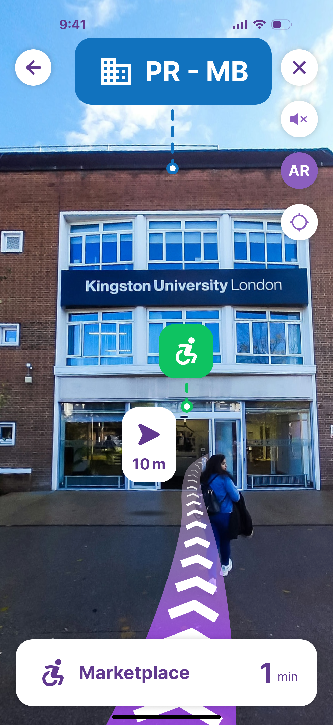 AR navigation screen outside a Kingston University London building labelled PR - MB, with a 10 m marker and a purple path to Marketplace