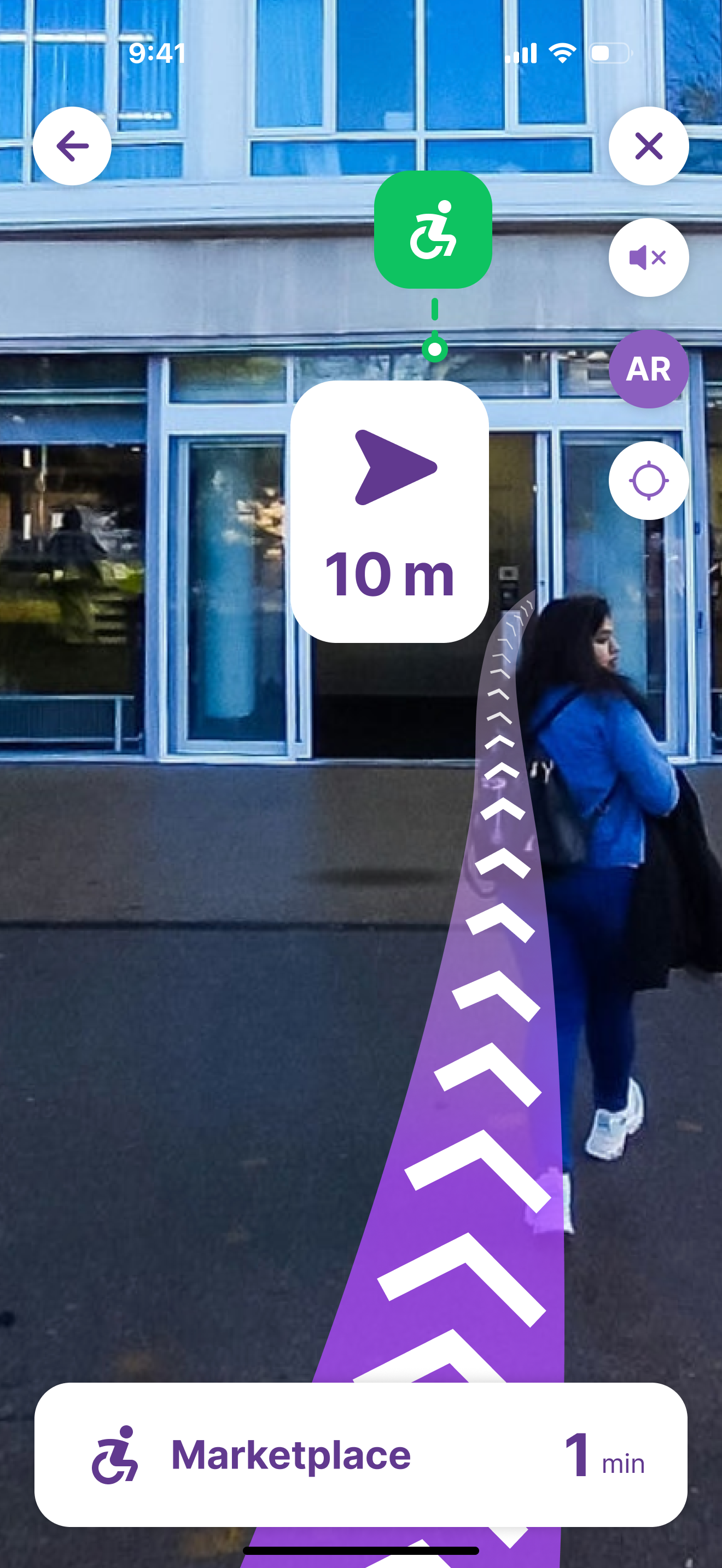 AR view beside the building: a large go-straight arrow at 10 m above the purple path, with Marketplace 1 min